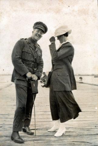 Sepia photograph of Chamberlain and female companion.