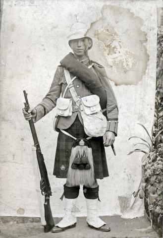 Black and white full length portrait of John Richardson in uniform.