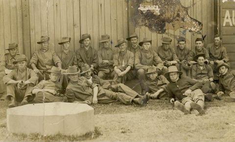 Sepia photograph of soliders in uniform featuring Henry Edward O'Neill.