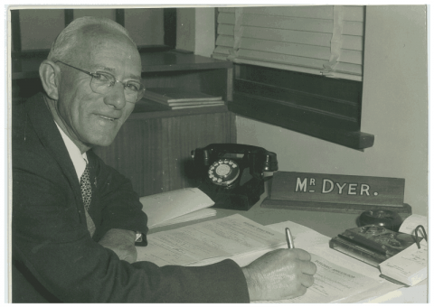 Black and white photograph of Martin Dyer writing.