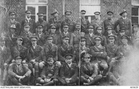 Black and white photo of men in uniform
