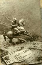 Sepia picture depicting Napoleon on horseback.