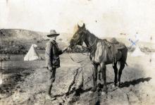 Black and white photograph of Thomas Kennedy Irwin Jr with horse
