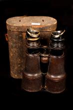 Picture of field glasses with its case.