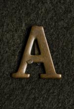 Image depicts a picture of the Anzac badge.