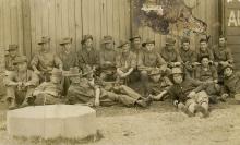 Sepia photograph of soliders in uniform featuring Henry Edward O'Neill.