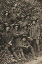 Eddie Stewart sepia photograph with comrades.