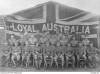 Black and white photo of army officers in front of Union Jack.